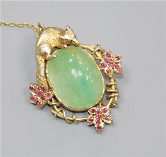 A gilt white metal, cabochon beryl and gem set oval pendant brooch, surmounted with a fox, 41mm